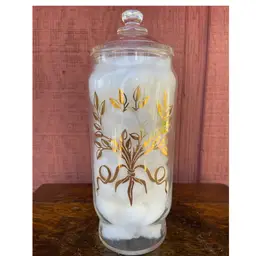 Clear Glass, Lidded Apothecary Jar. White & Gold Floral Decoration. 8”h. Unmarked.