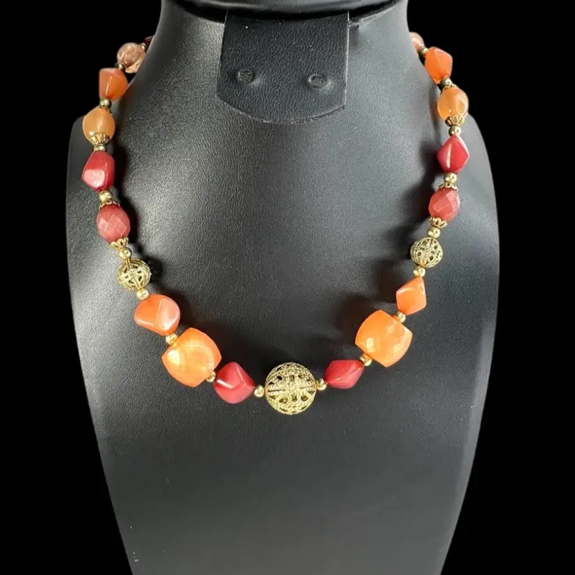 ROBERT ROSE Signed Orange Beaded Gold-tone Necklace. Lovely shades of orange & amber colored beads with beautiful gold-tone filigree center and side accents.