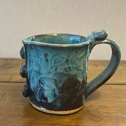 Blue And Brown Studio Pottery Mug With Flowers And Buttons
