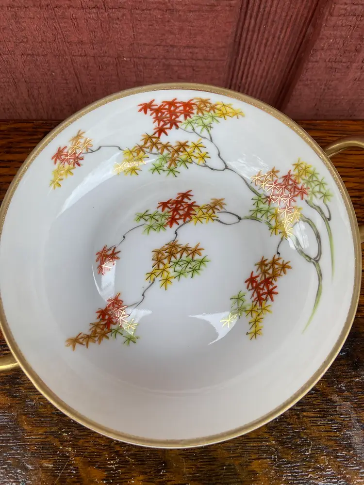 Hand-painted Nippon Bowl. Interior Is Painted Tree Branches With Autumnal-colored Leaves. Rimmed With Textured, Decorative Gold Paint. Gold-painted Handles.