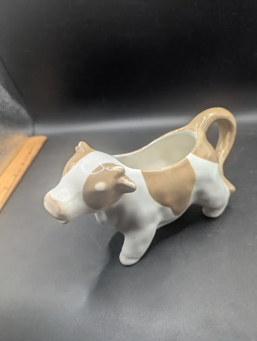 Pier 1 Imports White & Brown Cow Creamer.