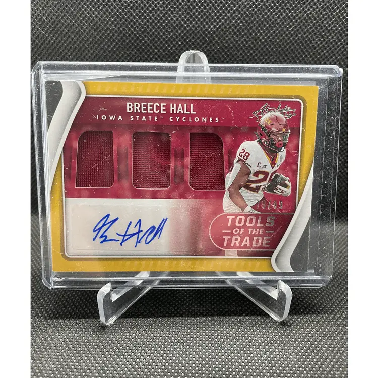 Breece Hall 2022 Panini Chronicles Draft Picks Absolute Tools of the Trade Triple Jersey Autographs #TTT-BHA 79/99 New York Jets