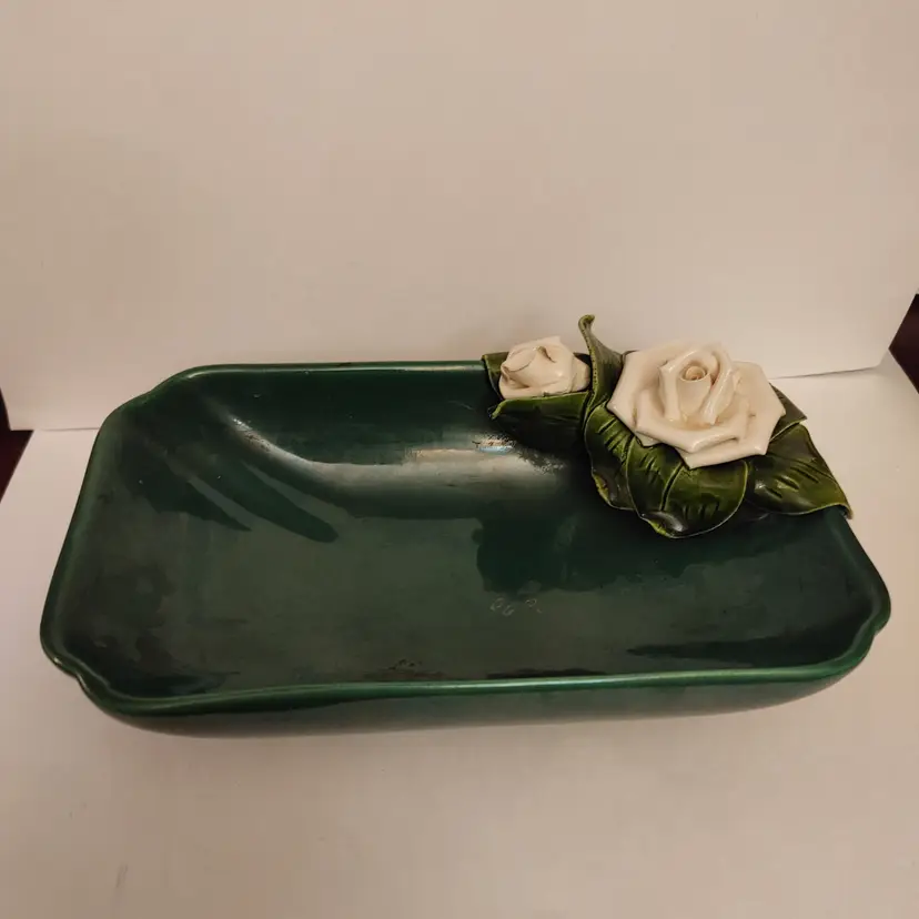 Green ceramic trinket dish. MCM. Frazier. Small chip as shown in pics. 5.5 x 8.5.
