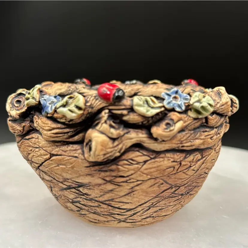 Studio Handmade Pottery Made By Nancy Steward Of Oregon has Flowers, Leaves And Ladybugs Done In A Rustic Coiled Branches With Texture On The Basket. Drink A Dish Or Candy Dish It’s Adorable.