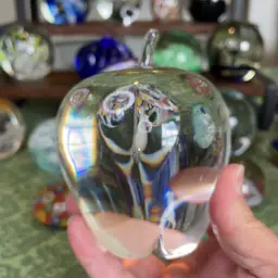 A16. Clear Art Glass Paperweight With Green Glow