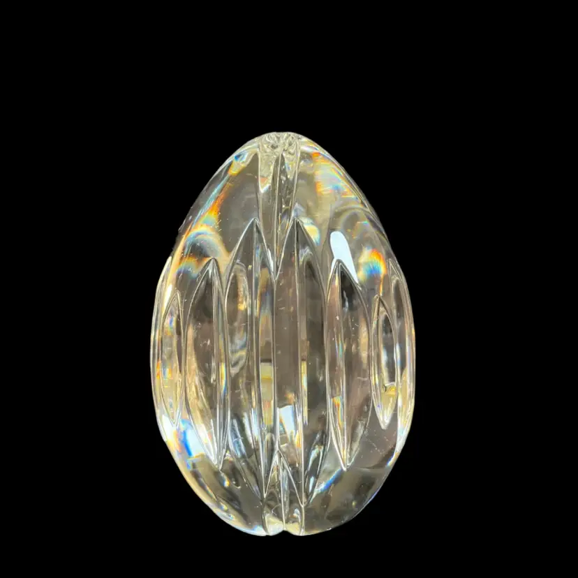 Lead Crystal Egg w/ Deeply Cut Vertical Wedge Facets Creating a Prism Like Effect in the Sunlight