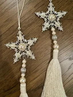 10” long 3” wide. Set of elegant jeweled snowflake christmas ornaments with pearl and bead tassels