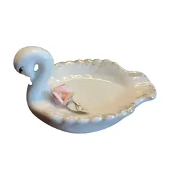 This is a vintage Napco porcelain swan trinket dish with a pink rose. - has been repaired