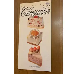 The Book Of Cheesecakes. Cookbook By Steven Wheeler