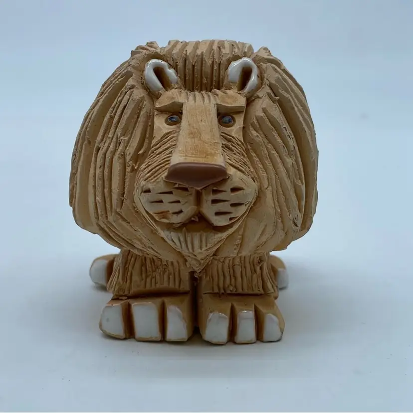 #3034 Hand-carved ceramic lion figurine by Artesania Rinconada.