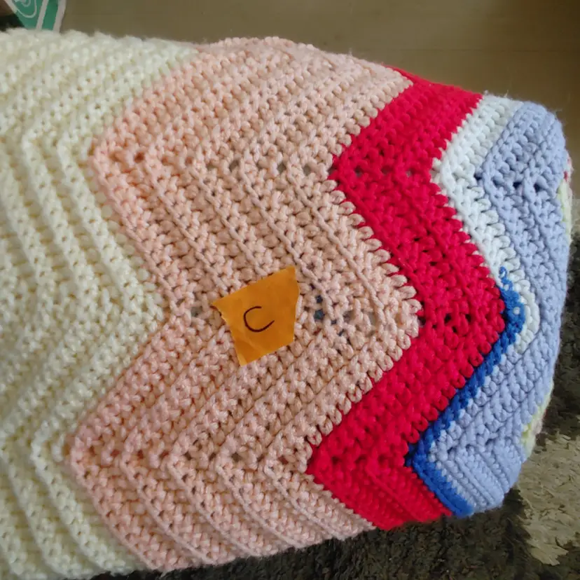 Afghan C- approx size 54 x 22. Multi color wide zig zag stripes. As shown.