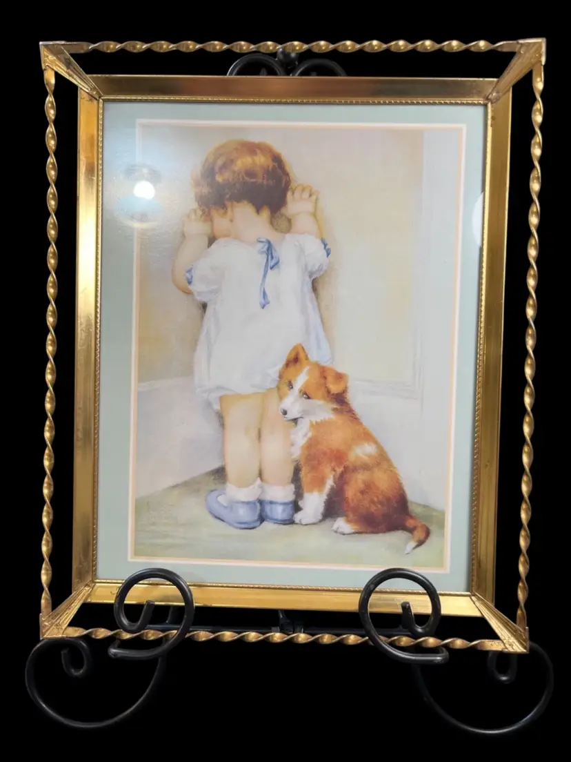 Print is from 1985-by Besse Pease Gutmann. "In Disgrace Girl and Her Dog" Framed in a BEAUTIFUL Vintage Brass Colored Frame w/ Raised Twisted Braid of Brass Colored Surrounding Frame-Lot 43