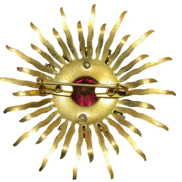 Multicolored Starburst Rhinestone Brooch. Unsigned