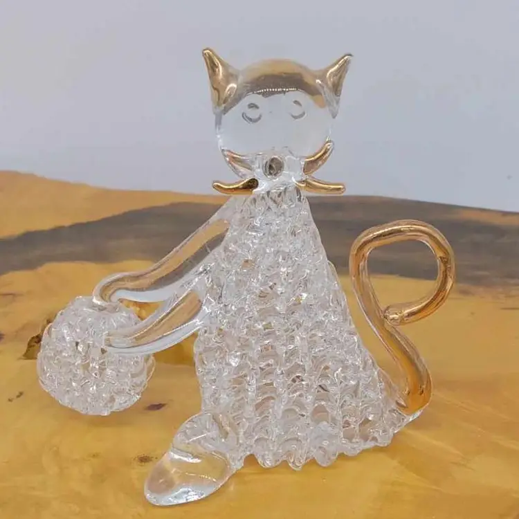 Hand blown, spun glass cat with yarn, gold details