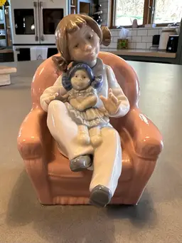 Nao By Lladro Figurine Girl with Doll sitting in Chair