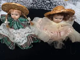 Two Vintage Mini Porcelain Dolls
