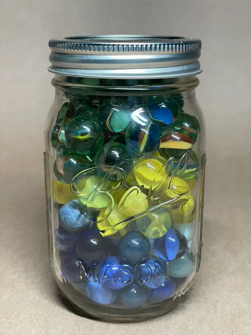 Clear Glass Ball Jar with Blue Yellow Green Marbles