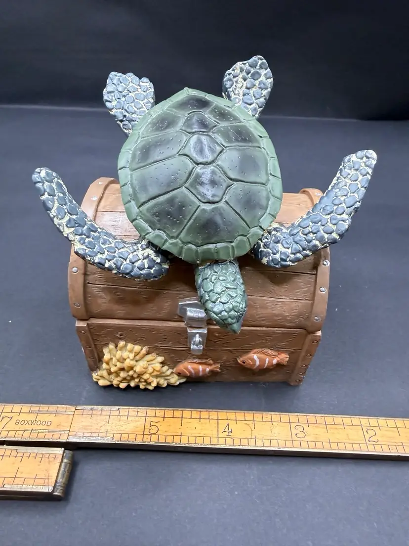 Vintage resin sea turtle figurine perched on a treasure chest Box