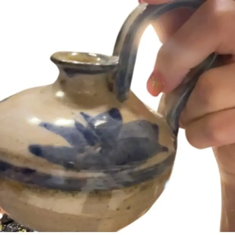 Pottery Ewer Signed. Measures 5”x4.5”.