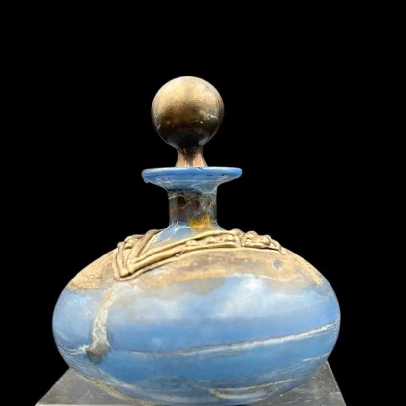 Perfume Bottle With Stopper, Blue Tone With Silver In Tone Accent. Possibly made in Israel has no makers Mark. could not find it anything like it rare peace.