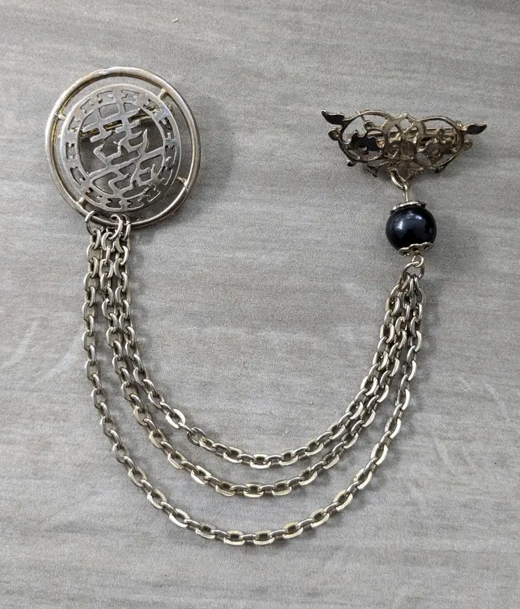 Swag Brooch with Asian Motif