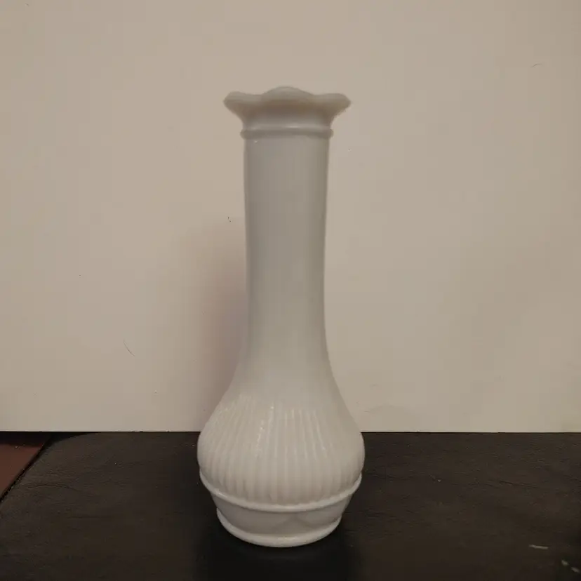 Randall milk glass bud vase. Vintage. 6 inches high. Small chip under top rim.