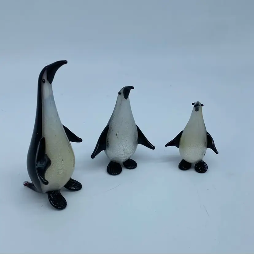 #1469 A set of three vintage Murano glass penguin figurines.