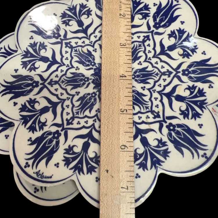 Set Of Two Matching hand-painted Turkish ceramic trivet with a blue and white floral pattern.