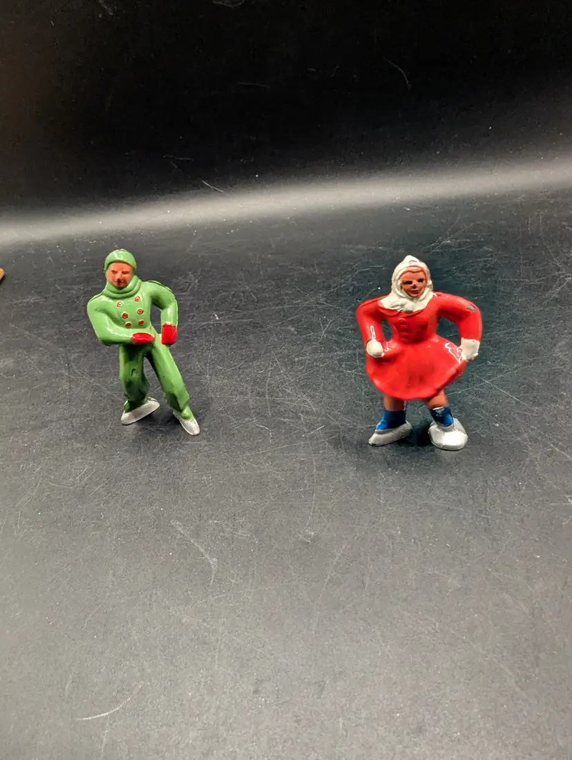 Vintage Set of 2 Barclay Type Metal Hand Painted Skaters Boy and Girl.