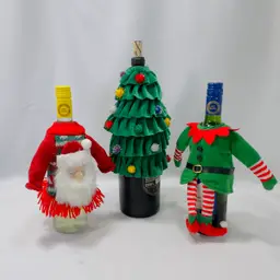 #1722 Lot of 3 St Nicholas Square Christmas Themed Wine Bottle Covers, Santa, Tree and Elf Suit