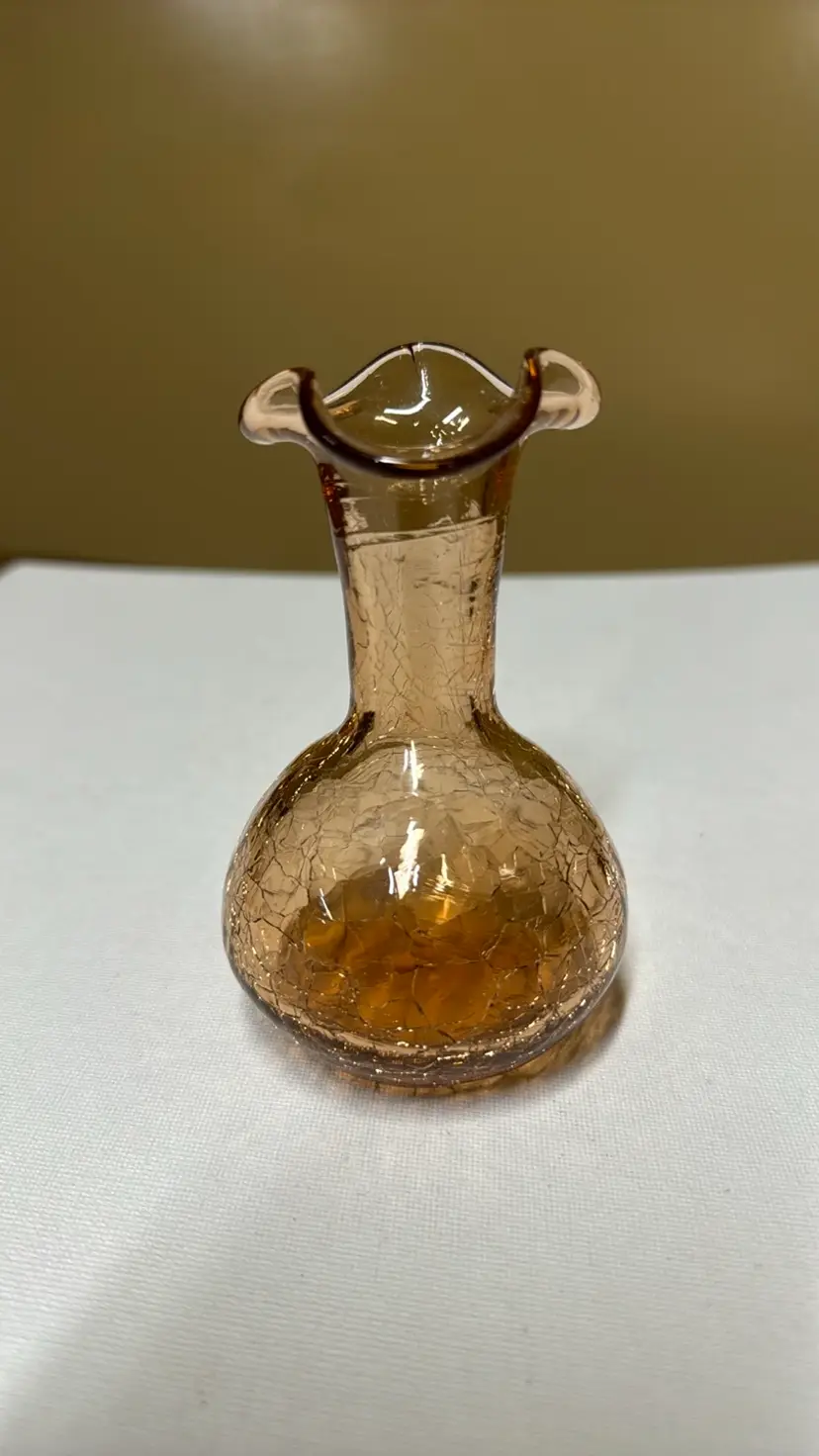 Crackle glass peach colored bud vase 4.5” tall

