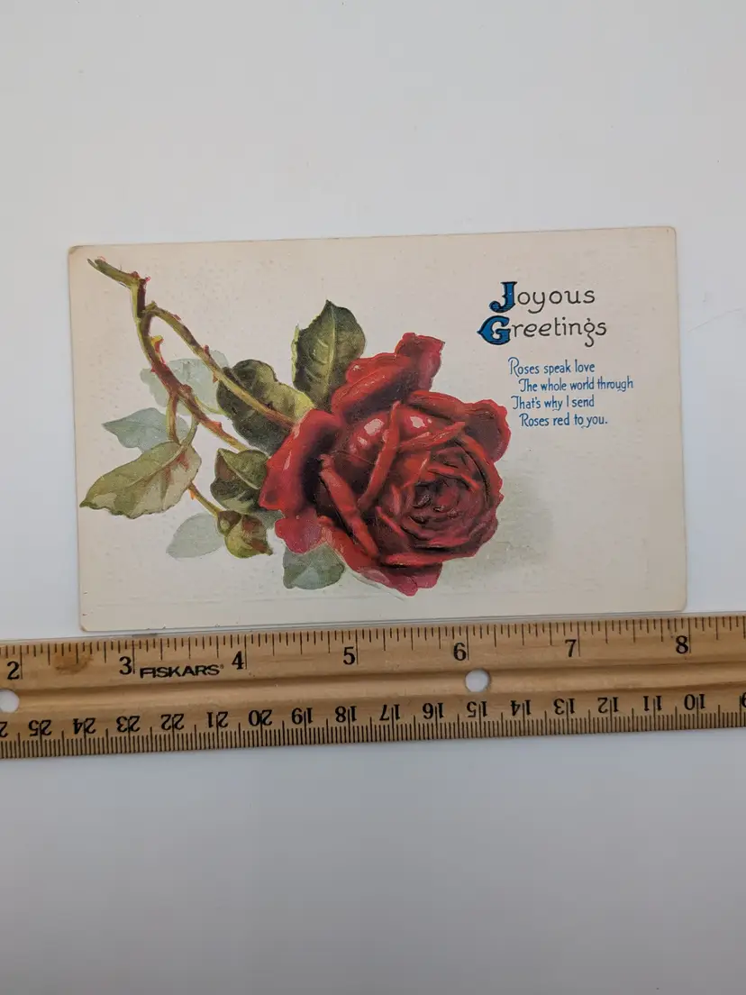 E104. Antique Postcard "Joyous Greetings" roses speak love the whole world through that's why I send red roses to you
