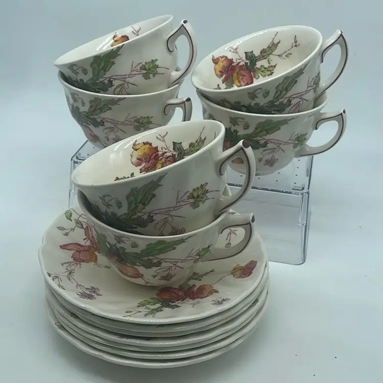 #1064 Vintage Royal Doulton Sherborne (D5915) teacups and saucers set.