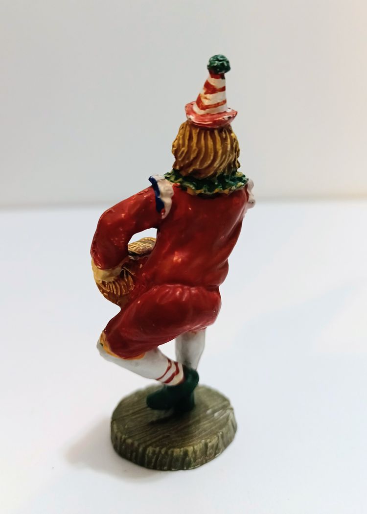 Charming Clown Performing with Pig