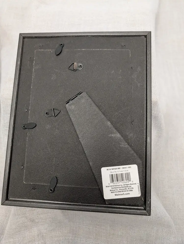 Repurposed Plastic dark wood toned Frame to hold rings or brooches