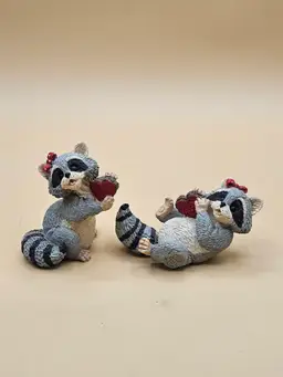 1996 Kathy Wise 2 Resin Raccoon Figurines W/Hearts, Tiny Chip on one