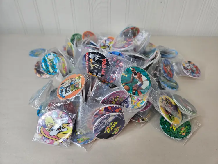 Lot of 300 NOS TAZO 1996 Space Jam Movie Pogs Warner Brothers Michael Jordan Bugs Lola