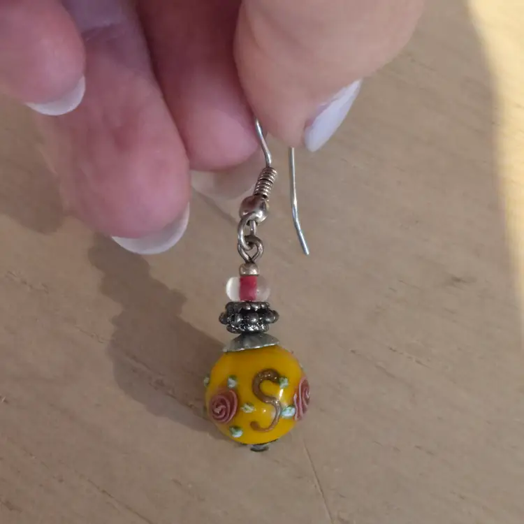 Victorian style painted yellow bead earring