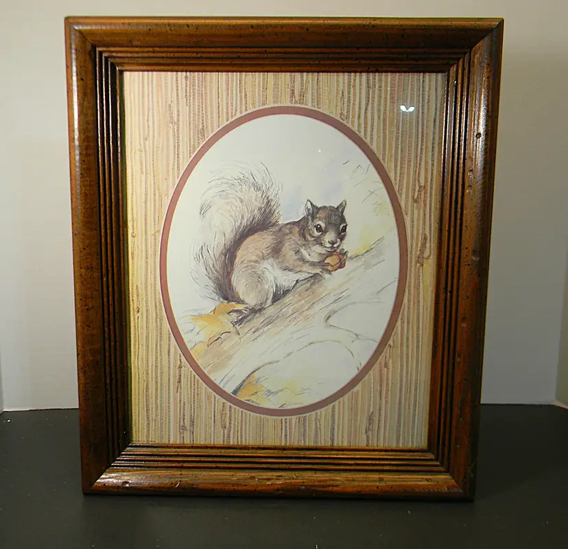 Squirrel  on a tree branch, with an acorn by Paul Whitney Hunter