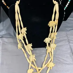 Hand Carved, Multi Strand Beige Shell Necklace With Elephants