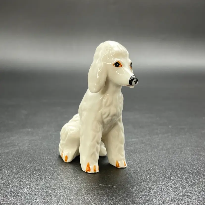 Porcelain Sitting Puppy Dog Poodle Hound Figurine