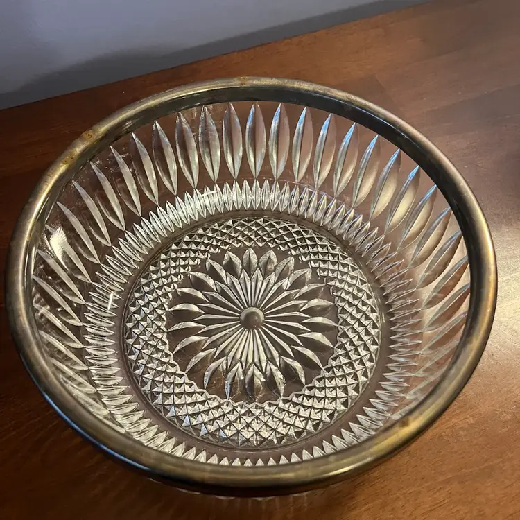silver-plated rim cut glass serving bowl. 9” Circa 1950-1970s 
Does Have Some Patina Around Silver Rim Pictured .