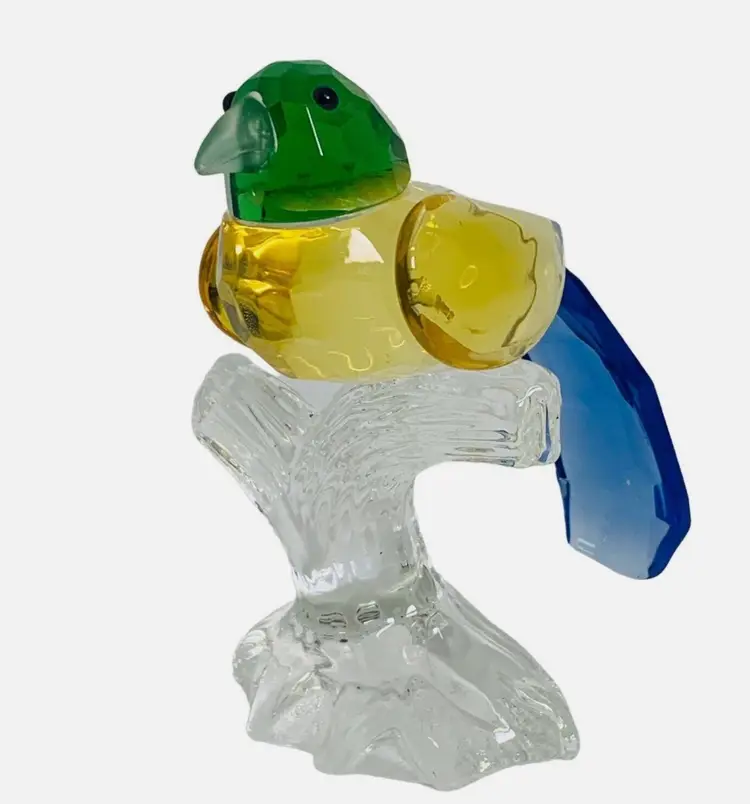 BEAUTIFUL CRYSTAL SONG BIRD PERCHED ON A BRANCH