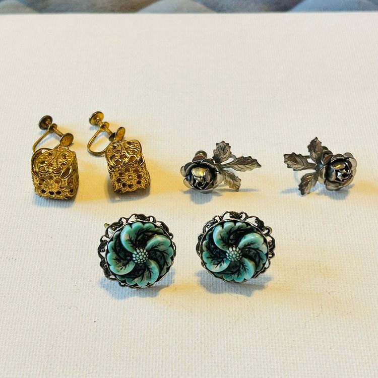 Set Of Three Vintage Unsigned Screwback Earrings - Gold Tone Filigree Dangle, Silver Tone Textured Rose, Silvertown Filigree Carved Acrylic