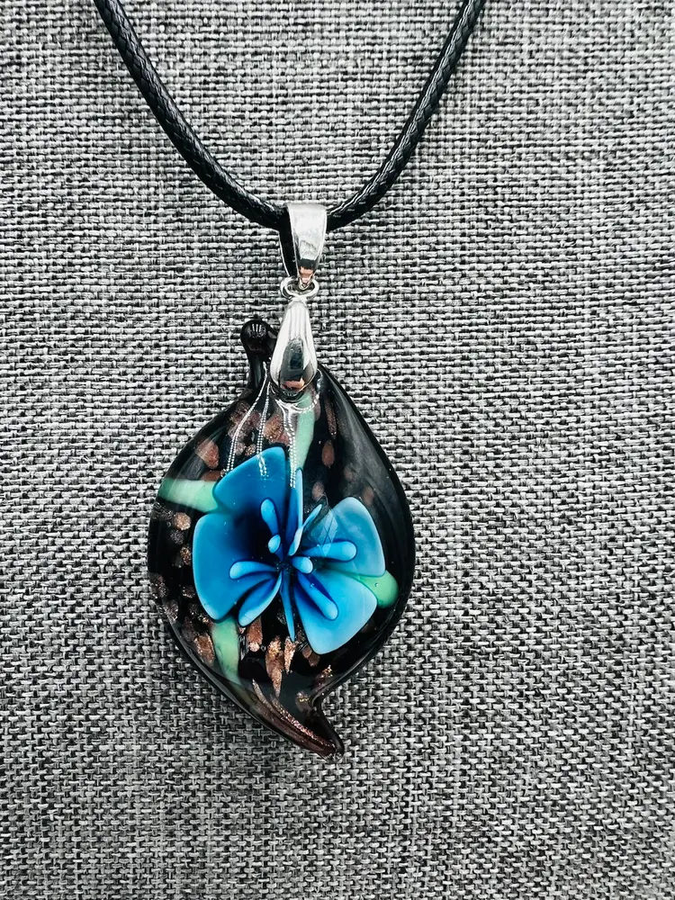 Glass Lampwork Blue Flower And Gold Shimmer Pendant With 18” Black Cord Necklace.