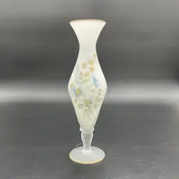 This is a vintage Russ miniature wooden Nativity scene ornament with original label. It is missing its string. Measures approximately 3.5" tall x 3" long x 2" wide. No chips or cracks