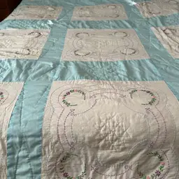 @ 76x51 Blue And White Embroidered Pattern Squares Hand Stitched With White Backing Quilt