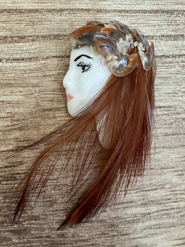 Lady Face With Shells And Feathers Detail Around Her Head-Signed And Dated
