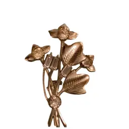 Rhinestone flowered, leafy brooch