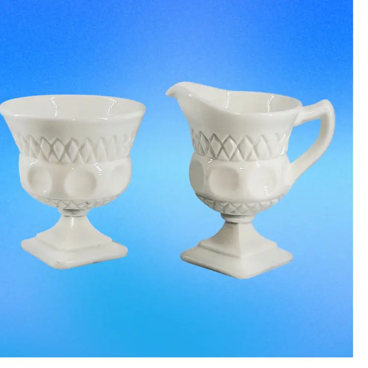 MILK GLASS 
CREAMER SUGAR SET
Plymouth Pattern 
BY McKee
